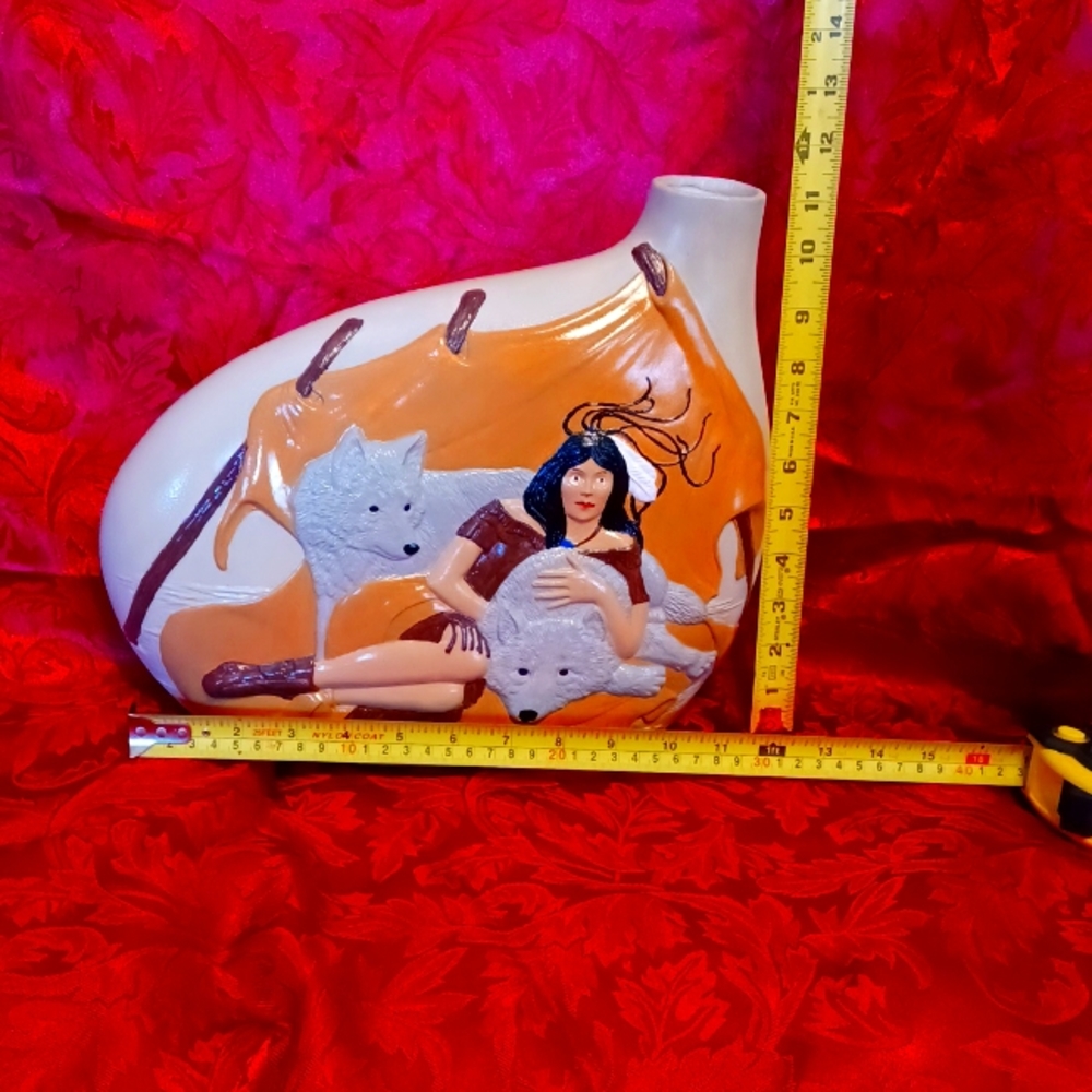 Large hand painted vase. Approximately 11 inches by 11 1/2 inches.